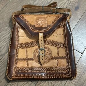 Vintage leather Mexican artisan embossed crossbody bag. Light and dark brown.